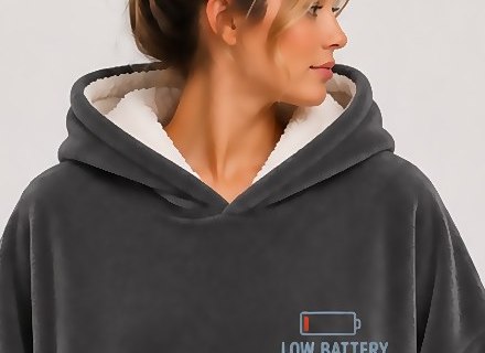 Close-up of the hood showing the cream sherpa lining.